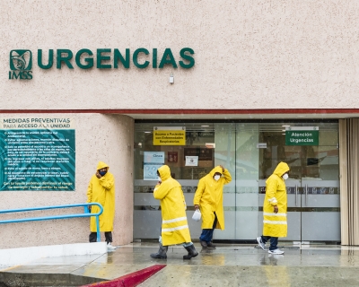 Maintenance employees of the IMSS hospital in Cabo San Lucas, Mexico, prep for Hurricane Genevieve on August 19, 2020. 