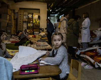 A Ukrainian girl draws in a bomb shelter at the Okhmadet Children&#039;s Hospital on March 01, 2022 in Kyiv. Chris McGrath/Getty Images